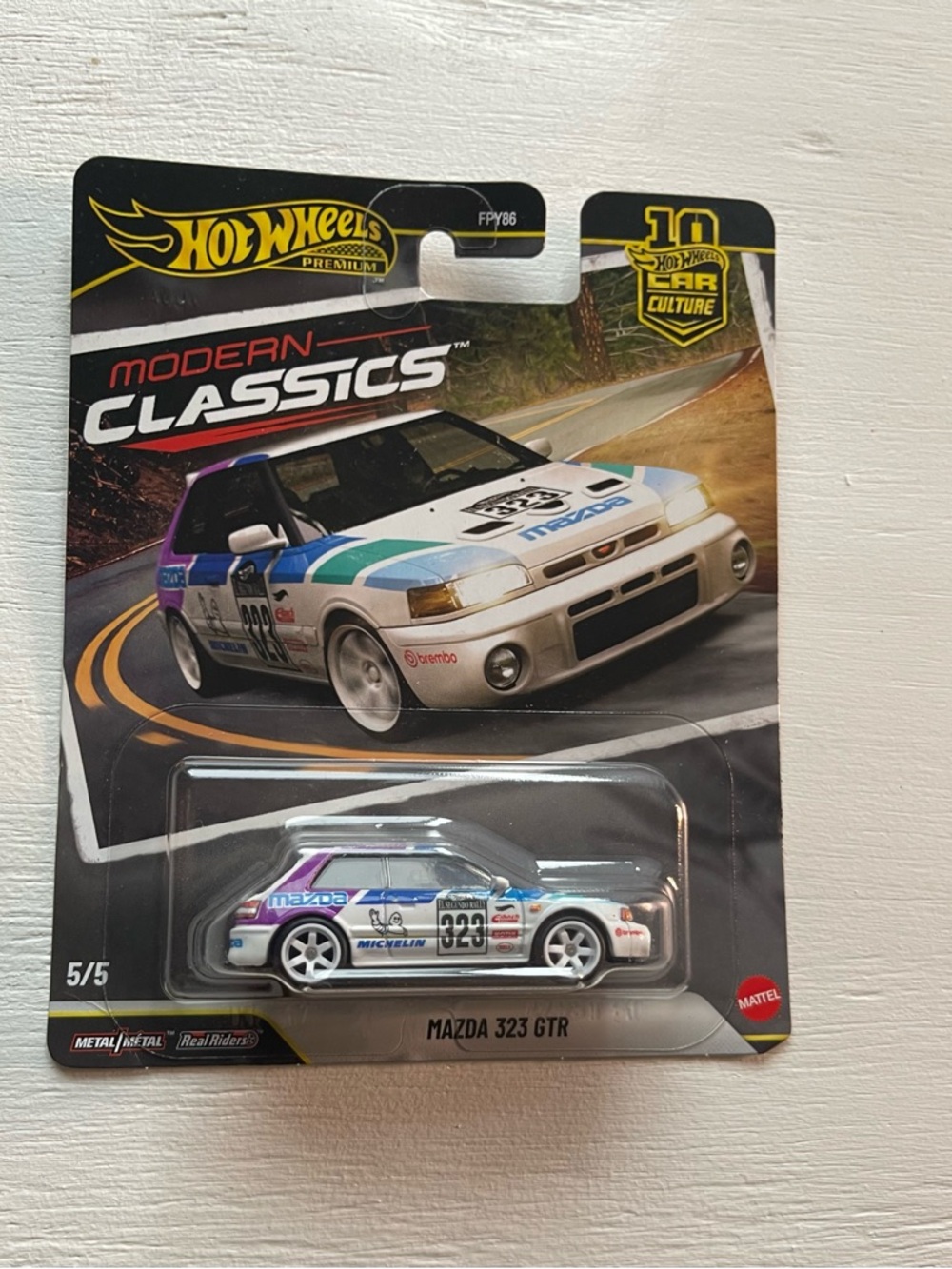 Modern Classics Mazda 323 GTR Toy Car - White with Blue & Purple Accents